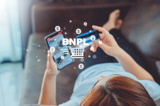 BNPL-Buy Now Pay Later shopping online icon , Online banking woman using Laptop ,smartphone holding credit card online shopping concept.