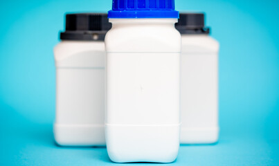 samples of plastic containers for chemical reagents without inscriptions