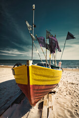 fishing boats on the beach - obrazy, fototapety, plakaty
