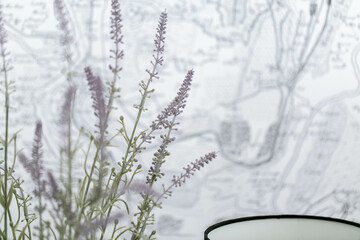 close up shot of a purple plant in a bedroom with white clean look