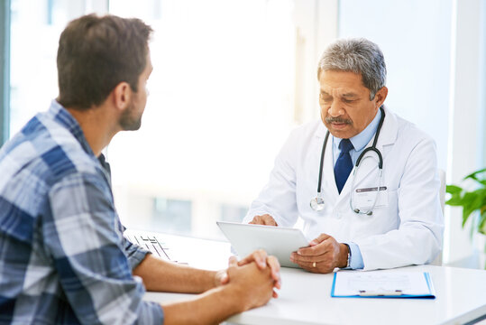 Senior doctor tablet, man patient and results with medical consultation and discussion in clinic. Hospital, talk and health insurance checklist of healthcare and wellness professional talking