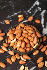 Peanut. Peanuts peeled in bowl. superfood. Vegetarian food concept. healthy snacks. close up