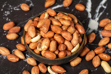 Peanut. Peanuts peeled in bowl. superfood. Vegetarian food concept. healthy snacks. close up
