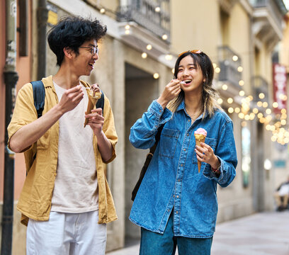 City Young Woman Travel Tourist Outdoor Couple Happy Vacation Lifestyle Holiday Street Summer Urban Tourism Traveler Town Journey Trip Ice Cream Dessert Food