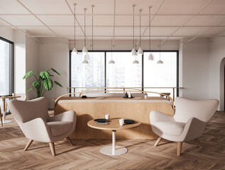White restaurant interior with armchairs