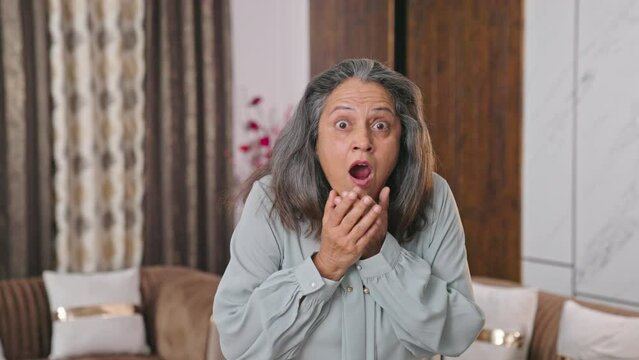 Shocked Indian modern woman afraid of something