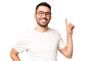 Fototapeta premium Young handsome caucasian man over isolated chroma key background showing and lifting a finger in sign of the best