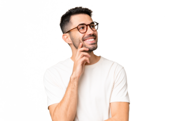 Young handsome caucasian man over isolated chroma key background thinking an idea while looking up