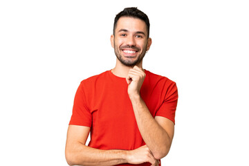 Young handsome caucasian man over isolated chroma key background laughing