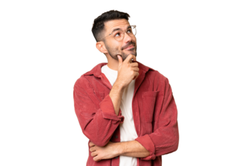 Young handsome caucasian man over isolated chroma key background having doubts