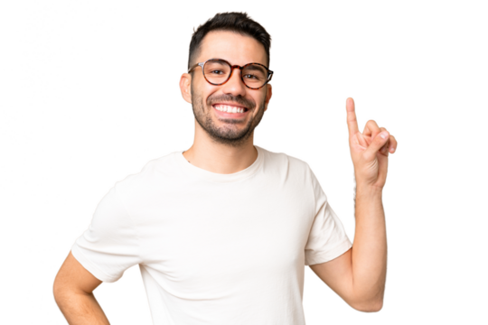 Young handsome caucasian man over isolated chroma key background showing and lifting a finger in sign of the best