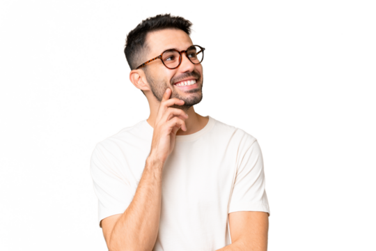 Young handsome caucasian man over isolated chroma key background thinking an idea while looking up