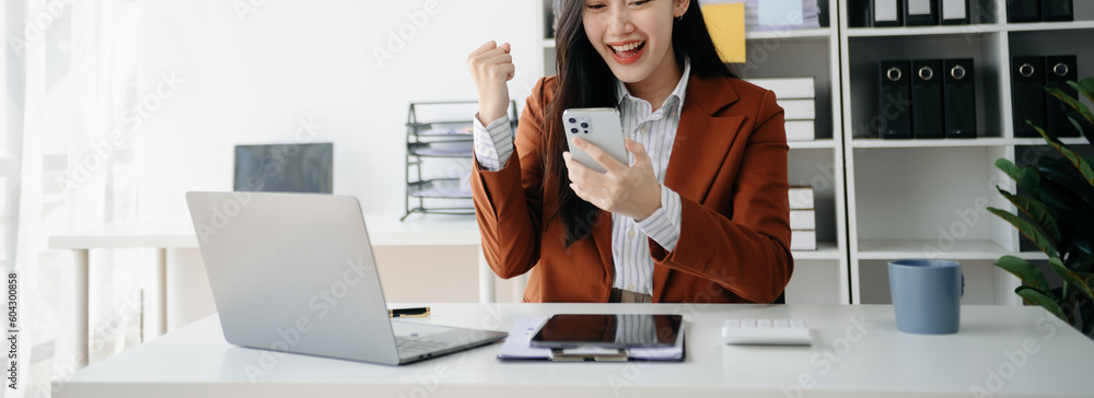 Aufkleber businesswoman hand working with new modern computer using on smartphone and tablet as concept..
