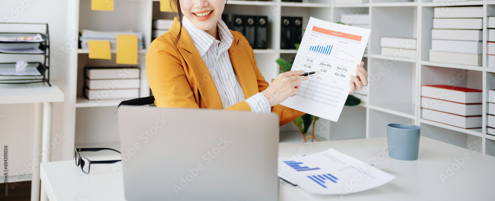 Poster businesswoman hand working with new modern computer using on smartphone and tablet as concept..