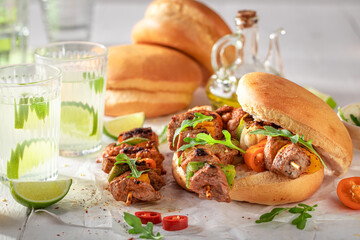 Healthy grilled shashlik with bun baked on a grilled.