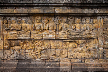Reliefs on the walls of the Borobudur temple in Magelang, Central Java, Indonesia. there are about 1,400 relief panels, the reliefs depict the story of the Buddha and his teachings.