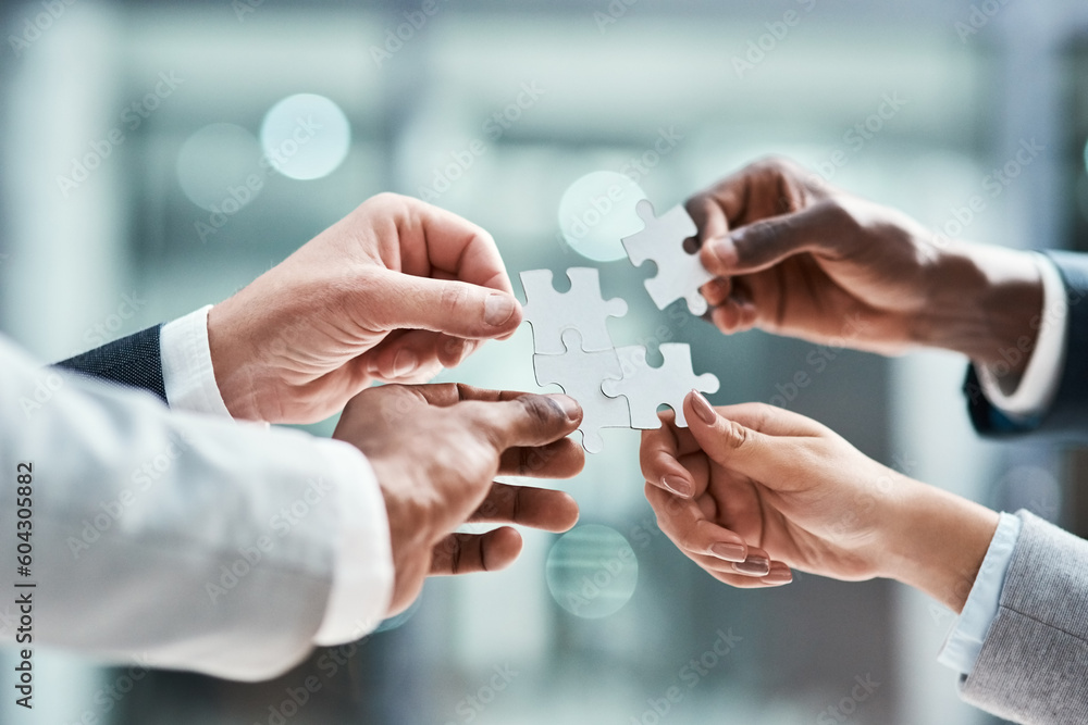 Aufkleber solution, business puzzle and group of people hands for goals, project integration and workflow or s