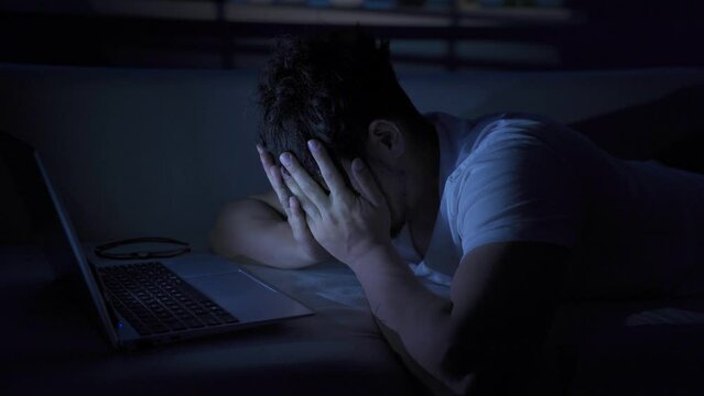 Frustrated young man crying.