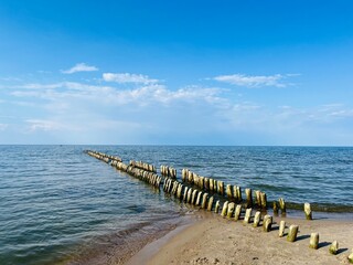 Transparent sea water, blue sea horizon, blue sky 