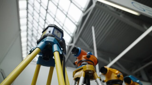 Geodetic tools standing next to each other.