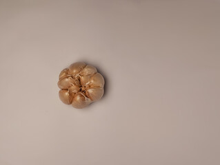 close up of organic product, garlic on white background, from above