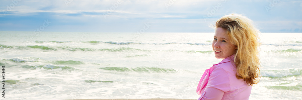 Wall mural smiling woman resting on the sea banner, tourism and travel, summer vacation, beach relax