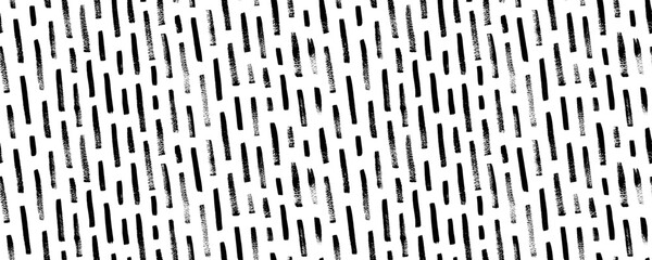 Diagonal stripes seamless pattern. Brush drawn dashed parallel short lines in grunge style. Rain or tech motif. Vector black brush strokes. Stylish monochrome striped texture. Contemporary pattern.