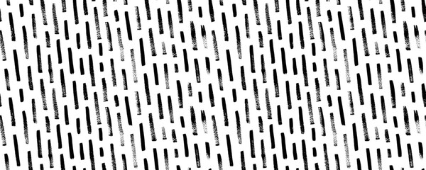 Diagonal stripes seamless pattern. Brush drawn dashed parallel short lines in grunge style. Rain or tech motif. Vector black brush strokes. Stylish monochrome striped texture. Contemporary pattern.