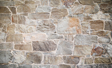 The rugged beauty of the stone wall texture reveals strength and history. A symbol of resilience, authenticity, and the passage of time etched in every crevice