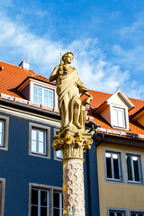 Fototapeta na wymiar Statue of Lady Justice in the old city of Rothenburg ob der Tauber, Bayern, Germany, Europe