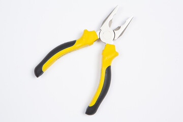 Fototapeta premium Set of tools for repair in a case on a white background. Assorted work or construction tools. Wrenches, Pliers, screwdriver. Top view