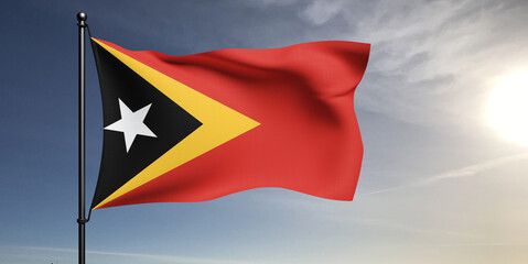 East Timor (Timor-Leste) national flag cloth fabric waving on beautiful grey sky Background.