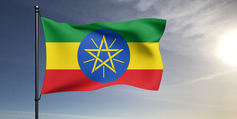 Ethiopia national flag cloth fabric waving on beautiful grey sky Background.