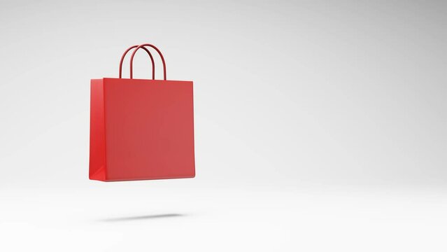 One Red Shopping Bag Spinning on a Studio Light Gray Background, Seamless Loop 3D Animation with Copy Space