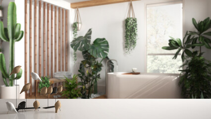 White table top or shelf with minimalistic bird ornament, birdie knick - knack over bathroom with bathtub and many houseplants, architecture interior design, urban jungle