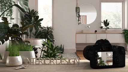 Architect photographer designer desktop concept, camera on wooden work desk with screen showing interior design project, modern wooden bathroom with houseplants idea