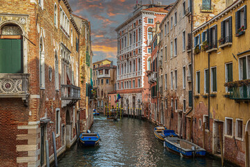 Fototapeta na wymiar View over the Rio di San Polo canal with typical Venetian houses. Venice, Italy