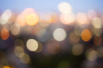Bokeh from incandescent lights in the city at dusk
