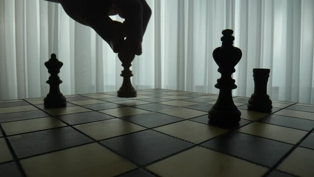 Strategy Concept of chess board game. Macro dolly moving forward.