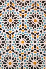 Zelfklevend Fotobehang Arabic pattern, moroccan zellige tiles, in the medina of Fes, Morocco © Elodie