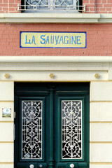 architectural detail on a facade of a house in Saint Valery sur Somme in France