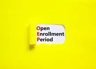 Deurstickers OEP symbol. Concept words OEP Open enrollment period on beautiful white paper. Beautiful yellow table yellow background. Medical and OEP Open enrollment period concept. Copy space. © Dzmitry