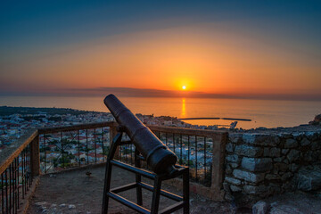 Beautiful sunset view from the historical castle of Kyparissia coastal town at sunset. Located in northwestern Messenia, Peloponnese, Greece, Europe.