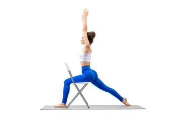 Young caucasian woman practice warrior pose using a chair, isolated on white.