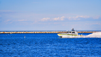 police patrol boat, patrols the coasts in the port area