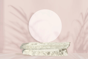 Stone podium. Grey pedestal. Natural shade from tropical plants, pink background, a showcase of rough gray stone. Abstract minimum