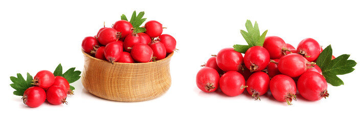 Hawthorn berry with leaf in a wooden bowl isolated on white background close-up