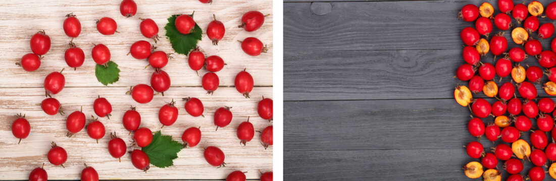 Hawthorn berry with leaves on a white and black wooden background. top view