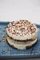 Italian cake. Dessert Tiramisu of coffee, sponge cake, mascarpone cheese and cocoa. Space for text.