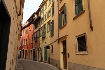 Fototapeta na wymiar Cozy and quiet street in the Italian city of Verona